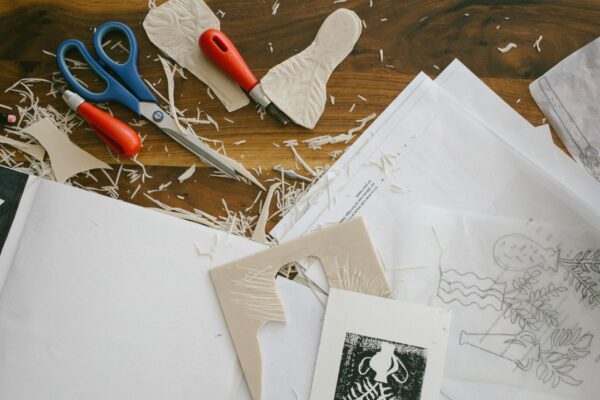 scraps of paper are cut out with a floral design